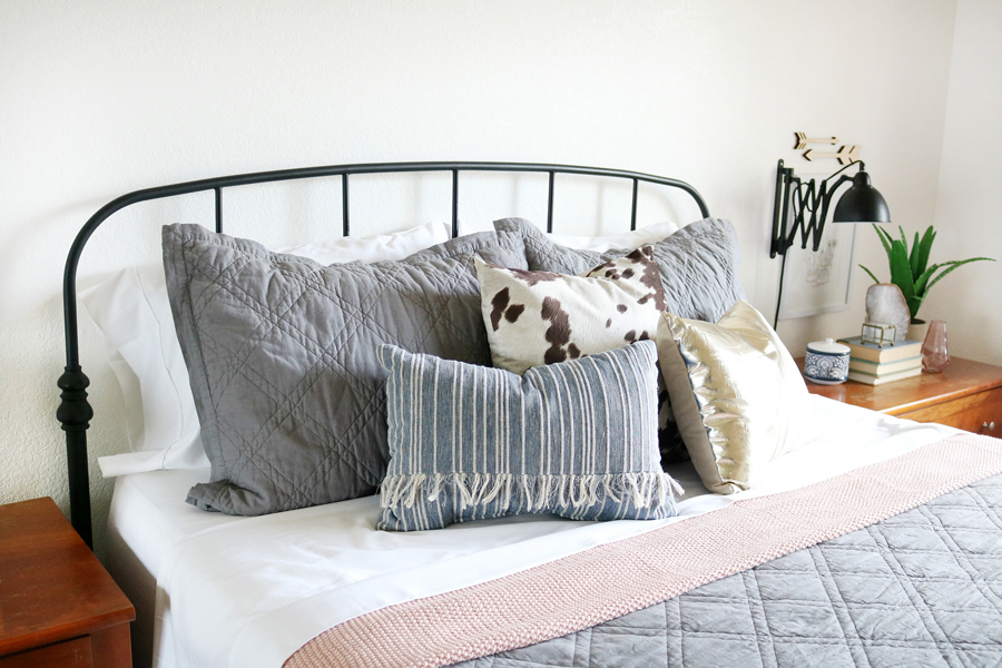 Easy Bedroom Refresh - Neutral basics mixed with soft touches of pinks and southwest decor pieces.